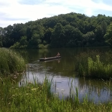 Boating across the Stone Age lake.